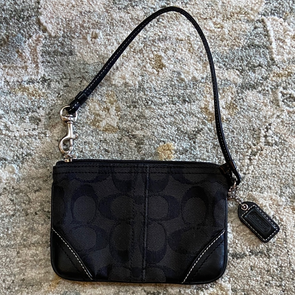 Coach Black on Black Signature C Fabric and Leather Wristlet.